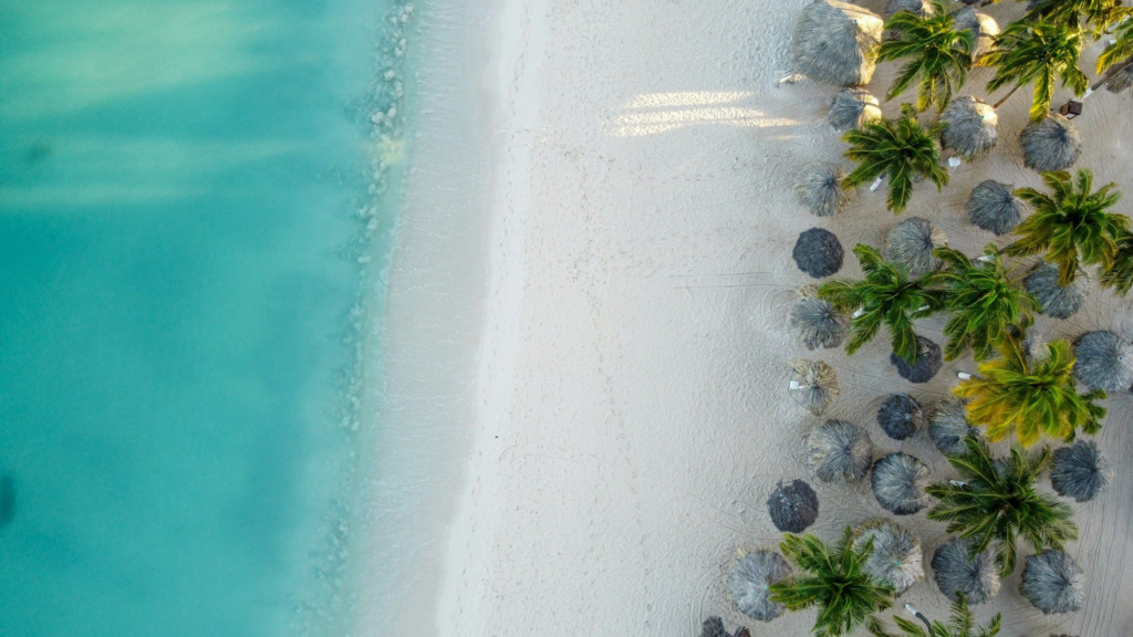 Aerial view of Palm Beach in Aruba with turquoise water