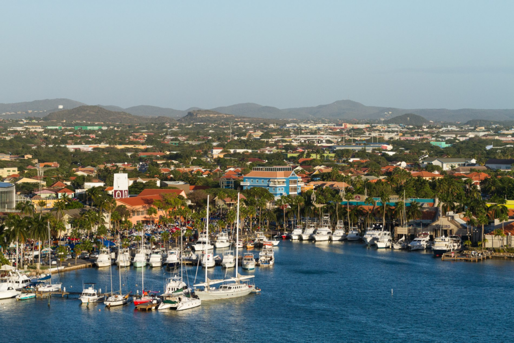 Sailboats moored in a marina in Aruba
