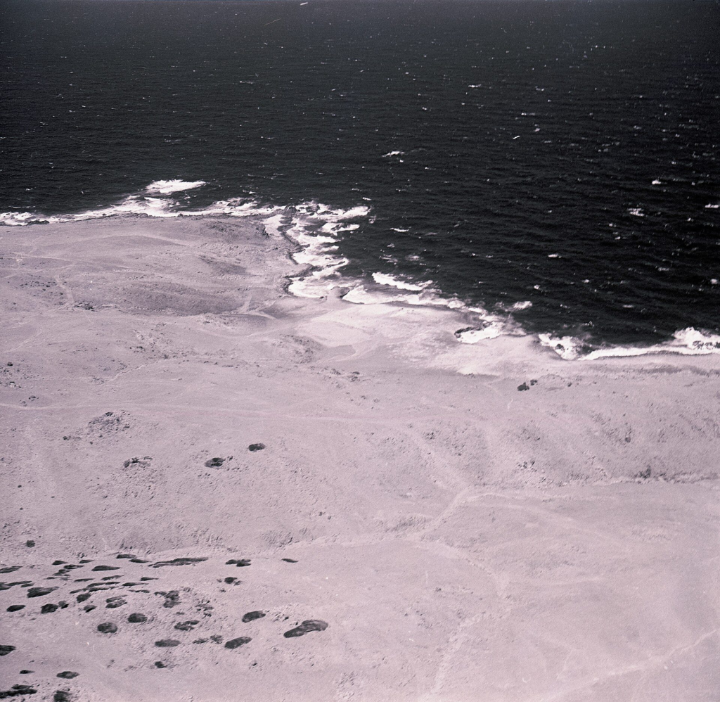 Black-and-white aerial photo of Aruba's north coast at Conchi