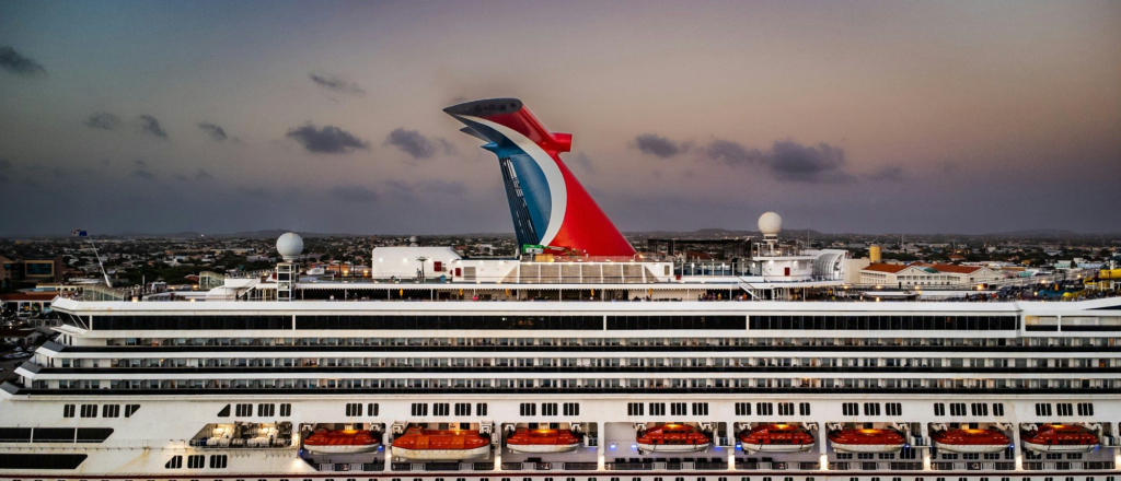 Cruise ship docked at the Oranjestad harbor in Aruba seen from above