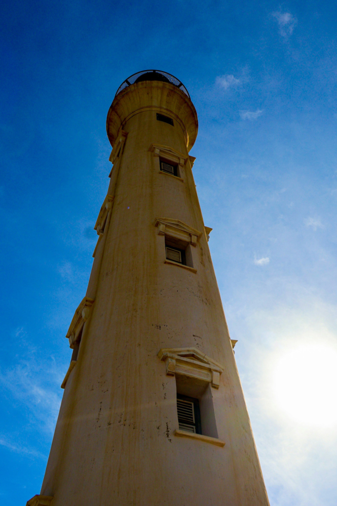 The California Lighthouse against a blue sky in Noord, Aruba