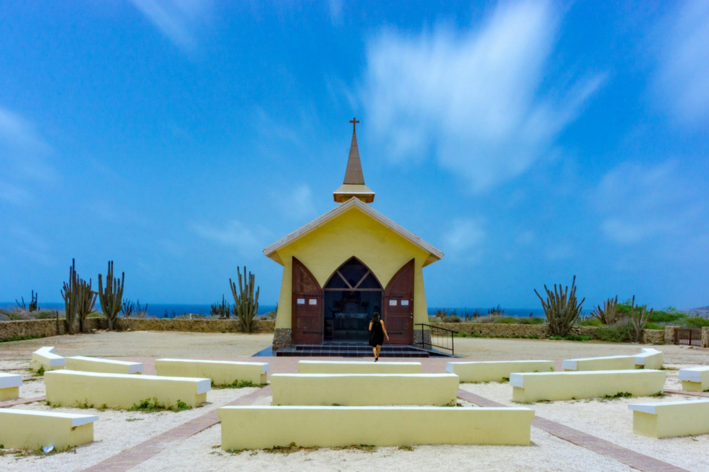Yellow building under a blue sky in the Alto Vista area of Noord, Aruba