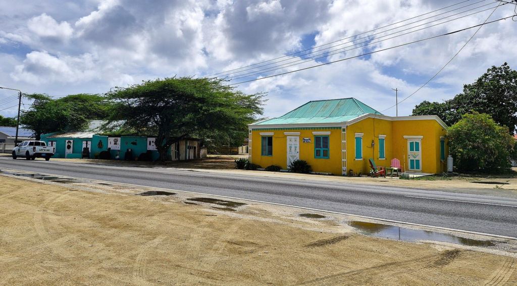 Traditional cunucu houses along the main road in Savaneta, Aruba